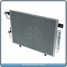 Load image into Gallery viewer, New A/C Condenser for Mitsubishi Montero - 2000 to 2006 - OE# 7812A050 QU - Qualy Air